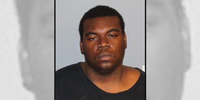 Sherman Lackland, 21, was charged by police in the alleged accidental shooting of a teen while playing the "No Lackin Challenge."