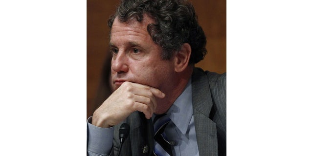 June 15, 2011: U.S. Senate Banking Subcommittee Chairman Sen. Sherrod Brown, D-Ohio, listens to a testimony during a hearing on banks and the financial crisis on Capitol Hill in Washington, June 15, 2011. (File/Reuters)