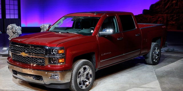 General Motors displays its 2014 Chevrolet Silverado full-size pickup truck after unveiling it and the 2014 GMC Sierra full-size pickup in Pontiac, Michigan.