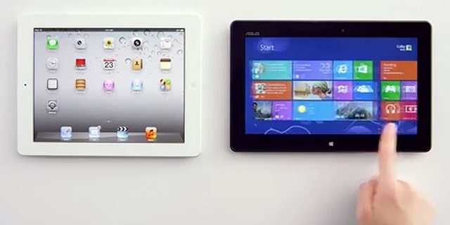 A new ad for Microsoft Windows 8 pits tablet against tablet, and enlists Apple's Siri to support Microsoft's cause.