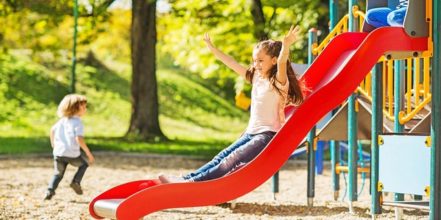 Children playing at a playground.