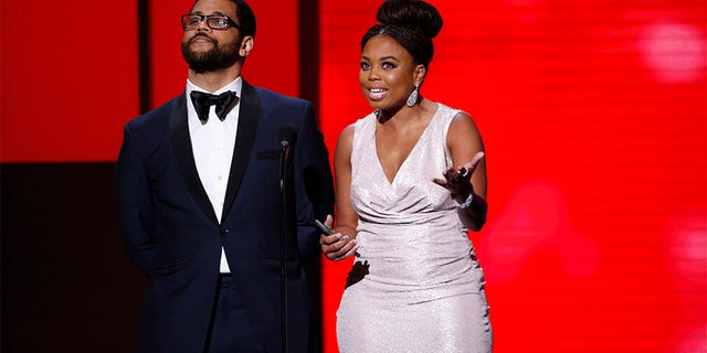 Michael Smith has accused ESPN of muting former co-host Jemele Hill.