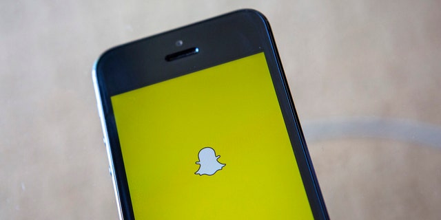 A portrait of the Snapchat logo in Ventura, California December 21, 2013.