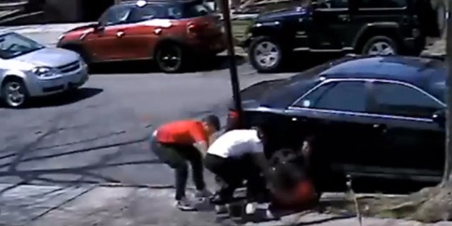New York City police released surveillance footage showing a teen being robbed of his sneakers during a daylight mugging.