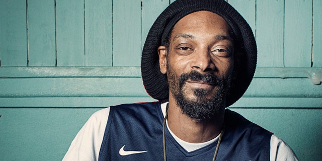July 30, 2012: This photo shows Snoop Dogg posing for a portrait at Miss Lily's in New York.