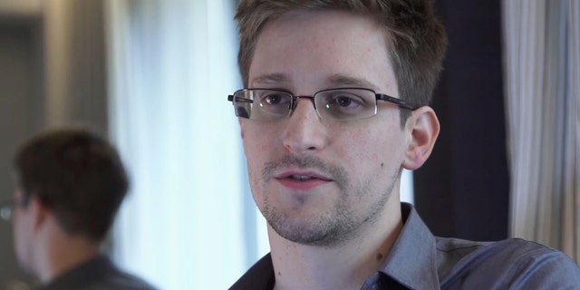 This June 9, 2013, file photo provided by The Guardian Newspaper in London shows National Security Agency leaker Edward Snowden, in Hong Kong.
