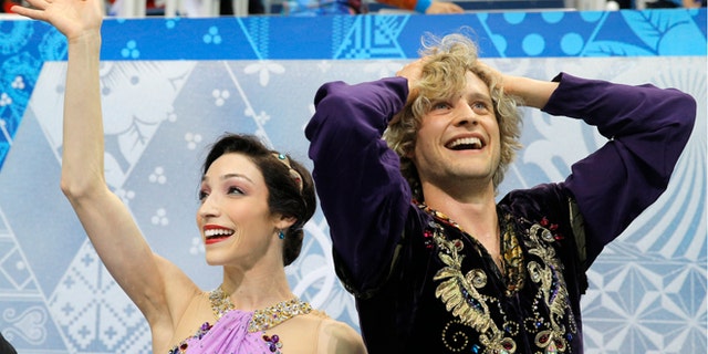 Feb. 17, 2014: Meryl Davis and Charlie White of the United States react in the results area after competing in the ice dance free dance figure skating finals at the Iceberg Skating Palace during the 2014 Winter Olympics in Sochi, Russia.
