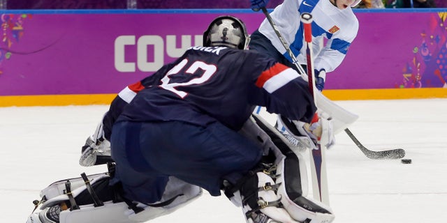 Feb. 22, 2014: Finland defenseman Olli Maatta shoots to score against USA goaltender Jonathan Quick during the third period of the men's bronze medal ice hockey game at the 2014 Winter Olympics in Sochi, Russia.
