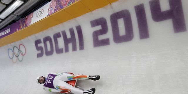 Feb. 6, 2014: Shiva Keshavan, who if from India but is competing under the Olympics flag, takes a turn during a training session for the men's singles luge at the 2014 Winter Olympics.