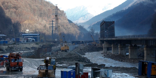 FILE 2012: A view shows a road and railway link to Krasnaya Polyana, a venue for the Sochi 2014 winter Olympics.