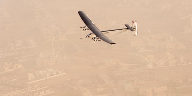 A view of the Solar Impulse 2 on flight after taking off from Al Bateen Airport in United Arab Emirates on March 9, 2015.