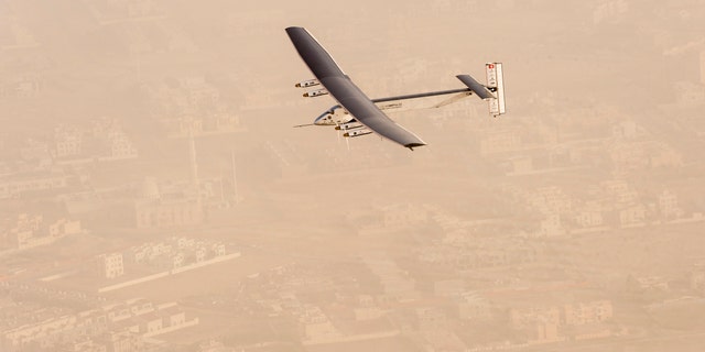 A view of the Solar Impulse 2 on flight after taking off from Al Bateen Airport in United Arab Emirates on March 9, 2015.