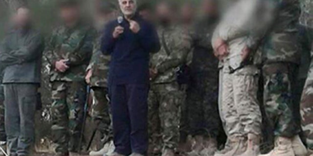 Maj. Gen. Qassem Soleimani, seen in blue suit, is commander of Iran's Islamic Revolutionary Guards Quds Force.