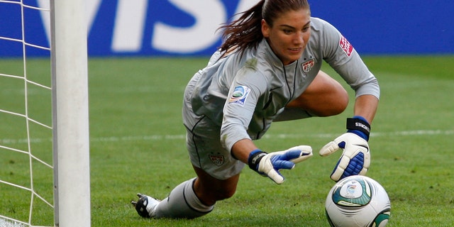 July 10, 2011:United States goalkeeper Hope Solo catches a ball during the quarterfinal match against Brazil at the Women's Soccer World Cup in Dresden, Germany. Solo received a public warning Monday, July 9, 2012, from the U.S. Anti-Doping Agency.