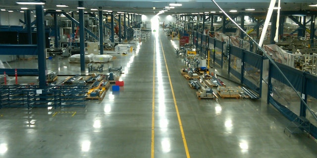 A view down the length of the massive Solyndra production floor, which will was auctioned off with the rest of the defunct company.