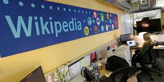 Mallory Whitt works at her desk at the offices of the Wikipedia Foundation in San Francisco, Wednesday, Jan. 18, 2012.