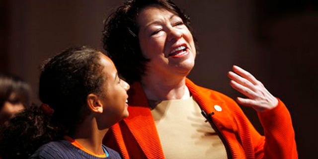 U.S. Supreme Court Justice Sonia Sotomayor, right, speaks next to Laura Vazquez at the University of Puerto Rico in San Juan, Puerto Rico, Tuesday, April 2, 2013.