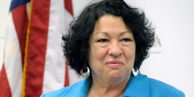 Supreme Court Associate Justice Sonia Sotomayor is introduced to speak at the University of the District of Columbia's David Clarke School of Law "Joseph Rauh, Jr., Conversation" in Washington, Monday, April 2, 2012. (AP Photo/Cliff Owen)