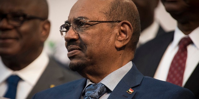 June 14, 2015: Sudanese president Omar al-Bashir is seen during a photo op at the African Union summit in Johannesburg. A South African judge on Sunday ordered authorities to prevent al-Bashir from leaving the country because of an international order for his arrest, human rights activists said.(AP Photo/Shiraaz Mohamed)