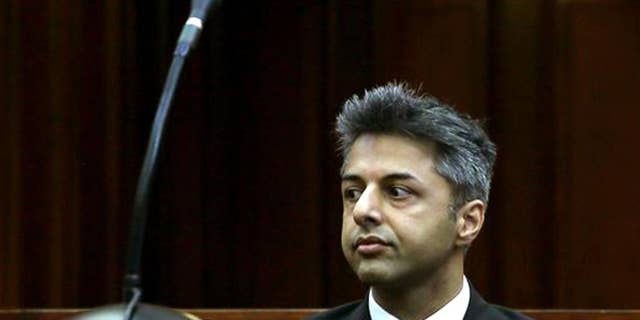 FILE - In this Monday, Oct. 6, 2014 file photo, British businessman Shrien Dewani appears in the high court in Cape Town, South Africa charged with orchestrating the killing of his wife Anni Dewani, while on honeymoon in the country four years ago. Dewan's lawyer, Francois van Zyl, said he plans to file an application on Wednesday, Nov.19, 2014 on the basis that state prosecutors had failed to prove that their client had orchestrated his wife's murder. The prosecution is expected to file their response on Friday. (AP Photo/Nardus Engelbrecht, Pool, File)