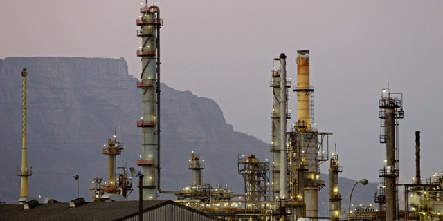 Feb. 8, 2012: An oil refinery is seen with Table Mountain in the background, Cape Town, South Africa.