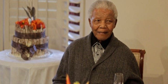 July 18, 2012: File photo, former South African President Nelson Mandela as he celebrates his birthday with family in Qunu, South Africa. South African President Jacob Zuma says that former President Nelson Mandela has been admitted to hospital in Pretoria to undergo tests. Zuma issued a statement Saturday, Dec. 8, 2012 saying that Mandela is "doing well and there is no cause for alarm."