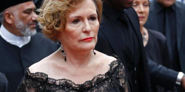 FILE - In this Thursday, Feb. 12, 2015 file photo Democratic Alliance leader, Helen Zille, arrives for the opening of Parliament in Cape Town, South Africa. Zille announced on Sunday, April 12, 2015 that she would not stand for re-election in the party's upcoming congress in May this year. (AP Photo/Schalk van Zuydam, File)