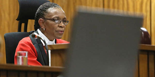September 12, 2014: Judge Thokozile Masipa delivers her judgement in court in Pretoria, South Africa. Masipa ruled out a murder conviction for the double-amputee Olympian, Oscar Pistorius, in the shooting death of his girlfriend, Reeva Steenkamp, but said he was negligent, and convicted him of culpable homicide. (AP Photo/Alon Skuy, Pool)