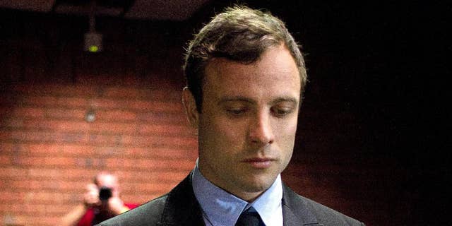 Aug. 19, 2013 - FILE photo of double-amputee Olympian Oscar Pistorius at the magistrates court to be indicted on charges of murder and illegal possession of ammunition for the shooting death of his girlfriend on Valentine's Day in Pretoria, South Africa.