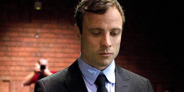 Aug. 19, 2013 - FILE photo of double-amputee Olympian Oscar Pistorius at the magistrates court to be indicted on charges of murder and illegal possession of ammunition for the shooting death of his girlfriend on Valentine's Day in Pretoria, South Africa.