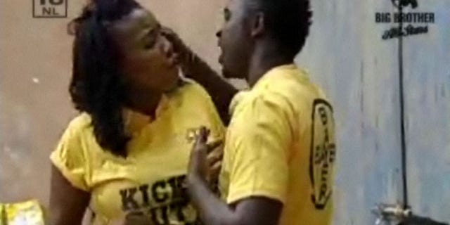 In this framegrab from the Big Brother reality show shows an altercation between Uganda's Hannington Kuteesa, and South Africa's Lerato Sengadi, this week. The South African pay channel says it will evict Kuteesa for assaulting female fellow star Sengadi on air. (AP)