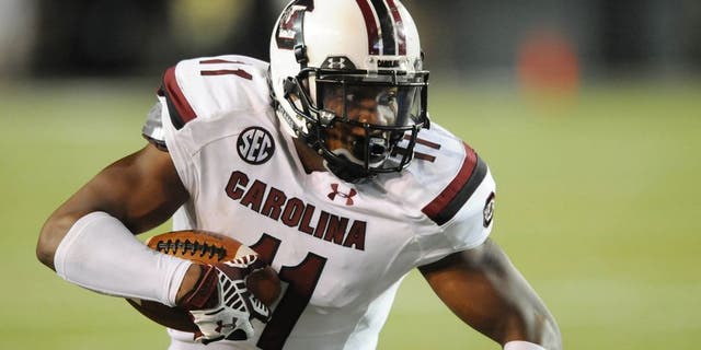Sep 20, 2014; Nashville, TN, USA; South Carolina Gamecocks receiver Pharoh Cooper (11) runs for a first down during the second half against the Vanderbilt Commodores at Vanderbilt Stadium. South Carolina won 48-34. Mandatory Credit: Christopher Hanewinckel-USA TODAY Sports