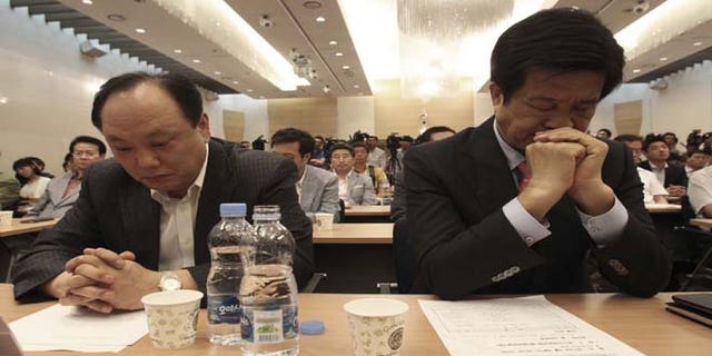 July 3, 2013: South Korean owners who run factories in the suspended inter-Korean Kaesong Industrial Complex, attend an emergency meeting in Seoul, South Korea. The owners demanded the South Korean Unification Ministry to approve a visit to the North Korean border town Kaesong and insisted their government and North Korean authorities resume the operation of the joint industrial complex.