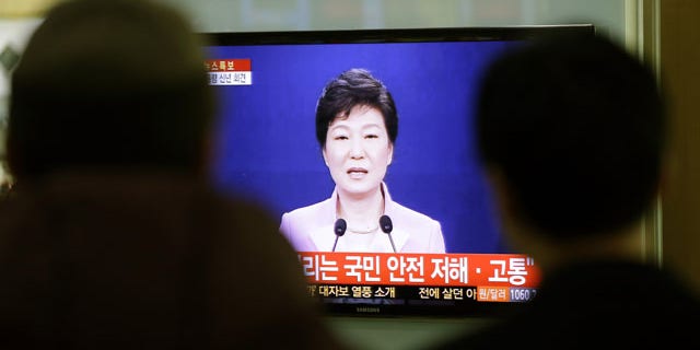 January 6, 2014: People watch a television program airing South Korean President Park Geun-hye's New Year's speech to the nation, at the Seoul Train Station. Park called on Monday for resuming reunions of families separated by war, saying it was a chance to improve strained ties between the rival Koreas. (AP Photo/Lee Jin-man)