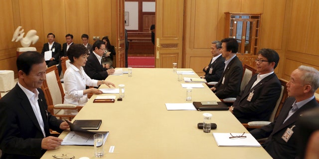 June 10, 2013 - South Korean President Park Geun-hye, 2nd from left, presides over a security meeting to discuss the upcoming South and North Korea talks at the presidential house in Seoul, South Korea.