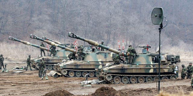 March 7, 2013 - South Korean soldiers work on their K-9 self-propelled artillery vehicles during an exercise against possible attacks by North Korea near the border village of Panmunjom in Paju, South Korea.