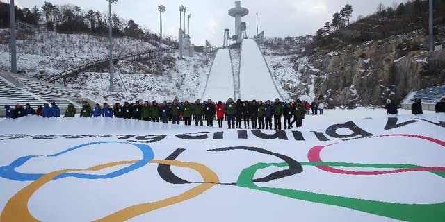 Participants attend an event marking the three-year countdown to the start of the 2018 Winter Olympics in Pyeongchang, South Korea, Feb. 9, 2015.