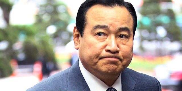 April 20, 2015: South Korean Prime Minister Lee Wan Koo arrives at the government complex in Seoul. Lee has offered to resign amid a bribery scandal about two months after he took up the country's No. 2 post. (Chun Soo-young/Yonhap via AP)