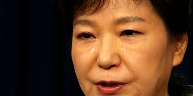 May 19, 2014: South Korean President Park Geun-hye weeps while delivering a speech to the nation about the sunken ferry Sewol at the presidential Blue House in Seoul. (AP Photo/Yonhap, Do Kwang-hwan)
