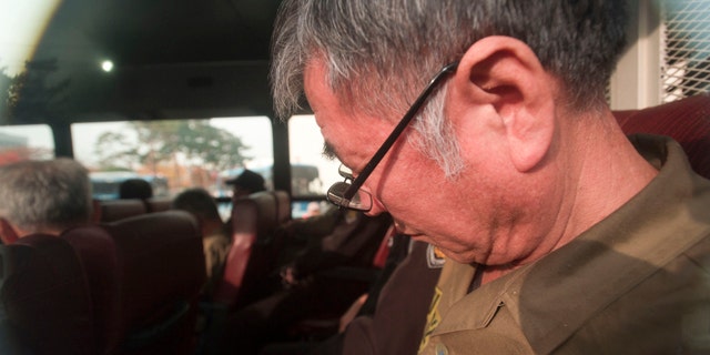November 11, 2014: Lee Joon-seok, the captain of the sunken South Korean ferry Sewol arrives for verdict and sentence session at Gwangju District Court in Gwangju, South Korea. (AP Photo/Yonhap, Hyung Min-woo)