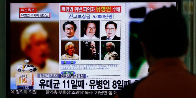 May 23, 2014 - A TV news program shows the reward poster of Yoo Byung-eun at the Seoul Train Station in Seoul, South Korea. South Korea is offering a big bounty to find the mysterious billionaire thought to be the owner a ferry that sank last month, leaving more than 300 people dead or missing.
