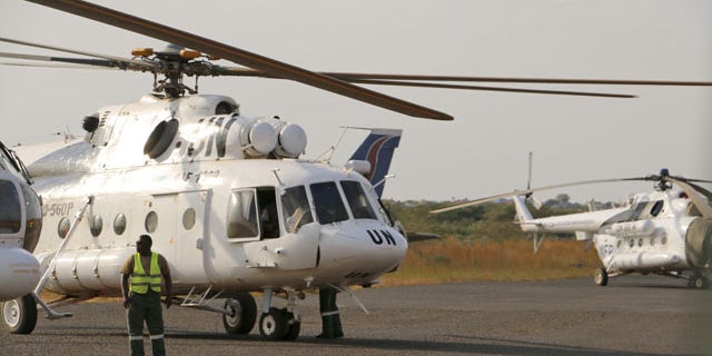Sunday, December 22, 2013: In this photo released by the United Nations Mission in South Sudan (UNMISS), a U.N. helicopter transporting wounded civilians from Bor, the capital of Jonglei state and said to be the scene of fierce clashes between government troops and rebels, arrives at the airport in Juba, South Sudan. (AP/UNMISS)
