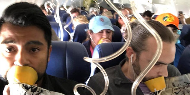 A photo inside the cabin of the recent Southwest flight that lost cabin pressure above 30,000 feet shows many passengers improperly placing oxygen masks on their faces, putting their lives at risk.