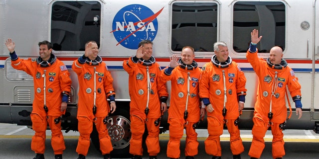 April 29, 2011: The crew of space shuttle Endeavour, from left, Canadian born U.S. astronaut Greg Chamitoff, mission specialist Drew Feustel, European Space Agency astronaut Roberto Vittori, of Italy, mission specialist Mike Fincke, British born U.S. astronaut, pilot Greg Johnson and commander Mark Kelly.