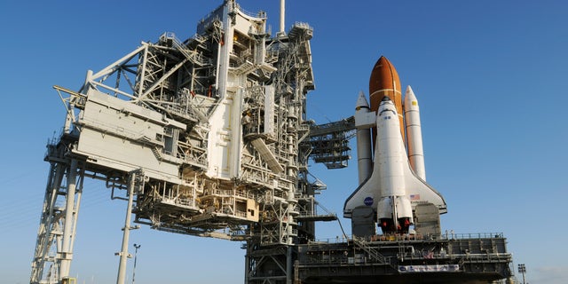 The space shuttle Endeavour sits on launch pad 39A on Friday, March 11, 2011. Endeavor is preparing for Mission STS-134 at the Kennedy Space Center which is scheduled for April 19, 2011. (AP Photo/Florida Today, Michael R. Brown) MAGS OUT