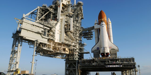 The space shuttle Endeavour sits on launch pad 39A on Friday, March 11, 2011. Endeavor is preparing for Mission STS-134 at the Kennedy Space Center which is scheduled for April 19, 2011. (AP Photo/Florida Today, Michael R. Brown) MAGS OUT