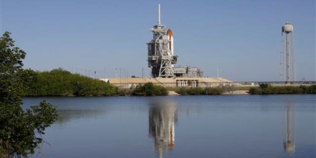 April 30: Space shuttle Endeavour is seen at Pad 39A at the Kennedy Space Center in Cape Canaveral, Fla.,. Yesterday's launch attempt was scrubbed due to technical problems. (AP)