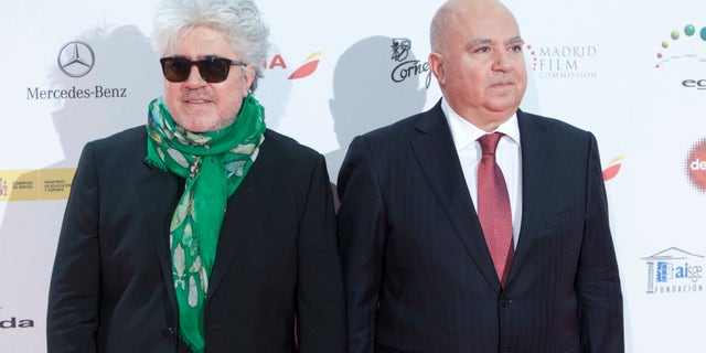 FILE - In this Monday Jan. 13, 2014 file photo, Spanish director Pedro Almodovar, left, and his brother the producer Agustin Almodovar poses for photographers during the photocall of the Jose Maria Forque Awards in Madrid, Spain. Agustin Almodovar said Monday, April 4, 2016, that he is blaming his lack of experience for a decision to set up an offshore company aimed at expanding their international film business in the 1990s. (AP Photo/Abraham Caro Marin, File)