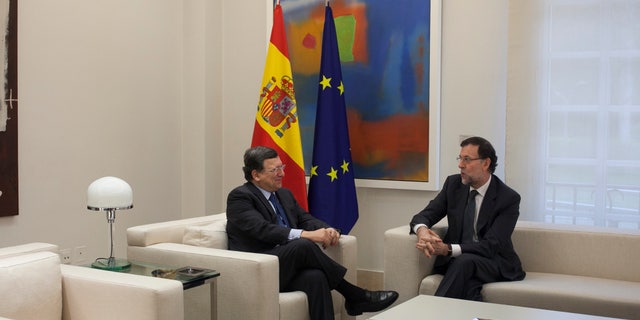 Spain's Prime Minister Mariano Rajoy and EU Commission President Jose Manuel Durao Barroso, in Madrid, Spain, Jan. 17, 2014.