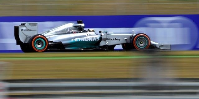 Mercedes driver Lewis Hamilton of Britain steers his car during the third free practice ahead of the Spain Formula One Grand Prix at the Barcelona Catalunya racetrack in Montmelo, near Barcelona, Spain, Saturday, May 10, 2014.  (AP Photo/Manu Fernandez)